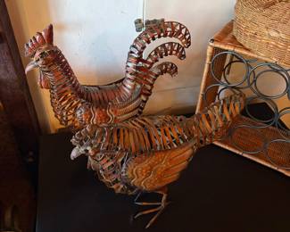 Hand-formed metal roosters 