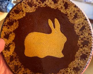 Signed Studio Pottery Rabbit Plate, 1989
Hand-thrown and hand-decorated studio pottery plate featuring a stylized rabbit motif. Signed with impressed maker’s mark and dated 1989 on the underside. Warm earth-tone glazes with rustic finish. One-of-a-kind artisan piece.
