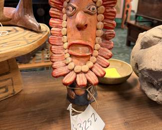 handmade ceramic or clay sculpture of a face with a decorative headdress or collar, possibly folk art. $250/OBO