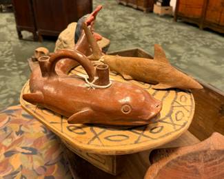 realistic Inca pottery stirrup vessel in the form of a fish,  terracotta vessel with incised and modeled details, including fins in bas-relief. $1,500/OBO.