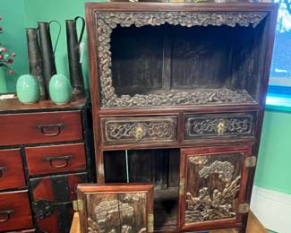 Chinese carved hardwood cabinet with high relief figural landscape, early 20th century, value $1500 OBO; 