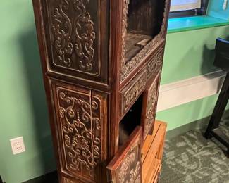 Chinese carved hardwood cabinet with high relief figural landscape, early 20th century, value $1500 OBO; 