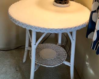 Round white wicker table (25” diameter, 26” high)
