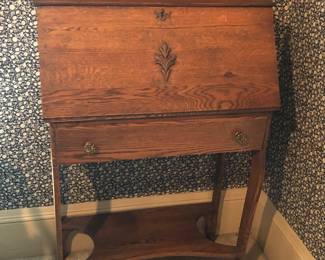 Antique oak dropfront writing desk (27.5”W, 43”H, 13” deep when closed)