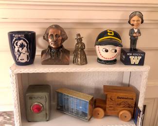 David Bowie mug, assorted vintage coin banks, Bob Rondeau bobblehead
