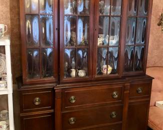 Mahogany china cabinet with bubble glass on upper doors (54”W, 16”D, 78”H)