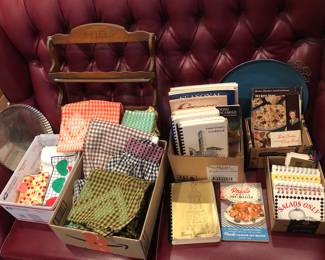 Wood spice rack, aprons, cookbooks