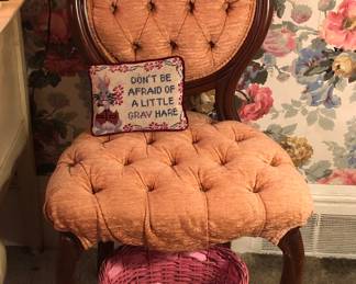 Boudoir chair with tufted pink upholstery