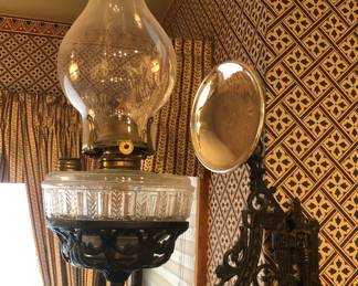 Oil lamp with iron wall bracket & mercury glass reflector 