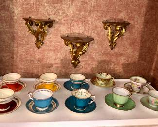 Italian gilt wall shelves, more cups & saucers by Aynsley, Royal Doulton, Royal Albert 