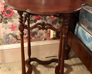 Parlor table with scalloped top & interesting base (24" diameter, 29" tall)