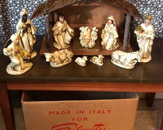 Vintage crèche & nativity set. Crèche is lighted & musical - has wind up music box on side  (Crèche is 20”L, 8”D, 12”H)