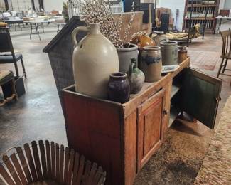 Crocks and shaker style picket fence basket.