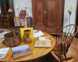 This table folds into a half moon table.  Beautiful finish 