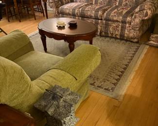 Couch with matching love seat and oversize green chair 