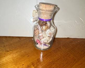 Seashells and Sand in Corked Glass Bottle