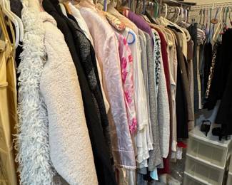 Assorted Womens Clothing in Closet