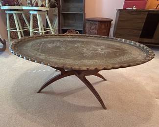 Carved teak and brass Moroccan coffee table