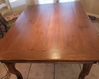 Solid wood dining table 79 inch long and 54 in wide, this beautiful handmade table was built from the wood out of the old Southern Hotel here in Hot Springs.