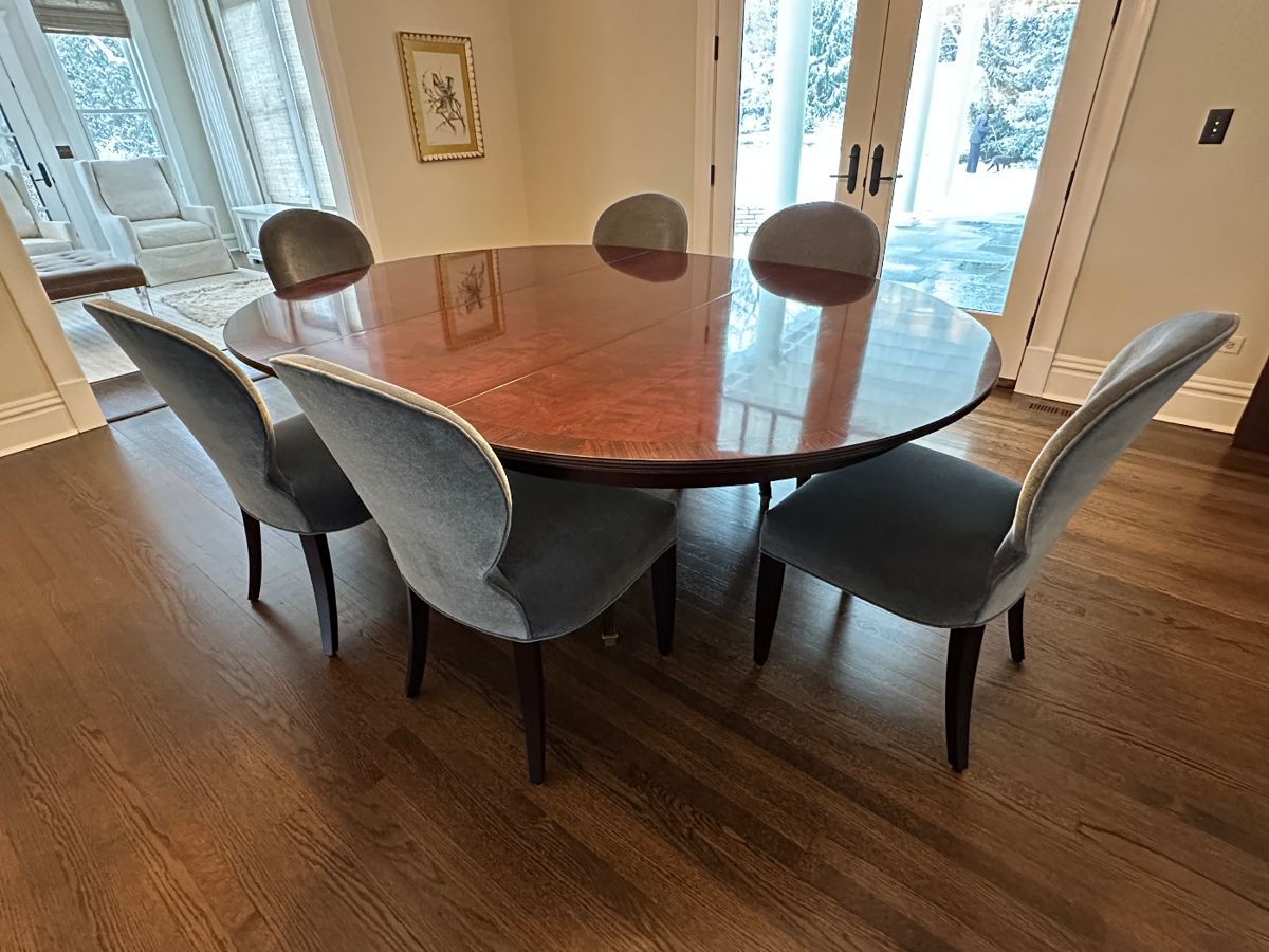 Hickory White dining table  (shown with leaf); includes pads 64" diameter with 24" leaf - $3000