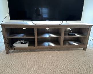 Walter E. Smithe TV/media stand 70"W x 16"D x 23"H - $500
