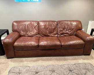 Walter E. Smithe leather sofa 92"W x 37"D x 34"W - $450