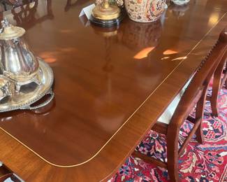 Close look at dining table with 3 leaves!