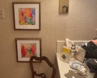 More art selections and one of two chairs