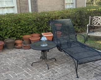 Planters and a lounge chair make a perfect patio!