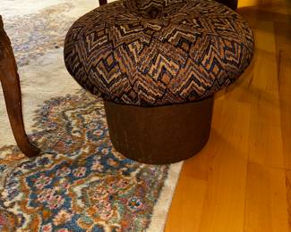 There are two of these vintage mushroom ottomans