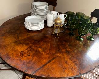 This is a favorite!  Beautiful round dining table with so much character!