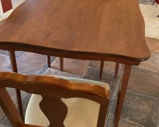 A Fancy Folding Card Table With Two Matching Folding Chairs