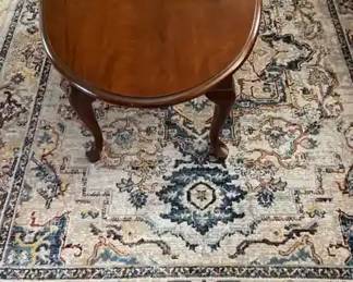 Oval Coffee Table And A Karina Collection Area Rug