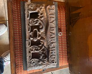 Wall hanging from a Little Darling wood burner stove.