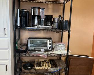 Toaster oven, 3 kinds of coffee pot, electric knives, roaster, cast iron skillet, mixing bowls, lem food saver,chopper, ice bucket