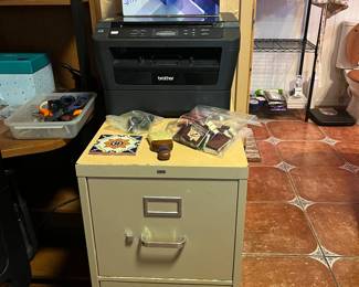 Ink cartridges, printer, two drawer file cabinet and all the office supplies you could ever want