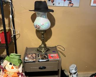 Brass lamp medical boots and scarecrow