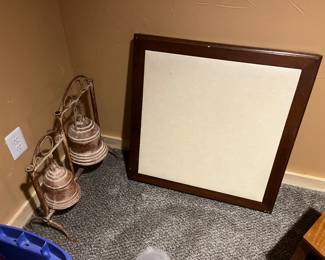 Folded wooden card table with leather top. Emaculate condition.
Mexico bells.