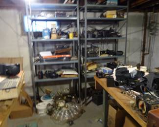 Loaded basement with tools, electronics, vintage cameras, tripods, projectors, vintage aircraft radio receiver and more!!