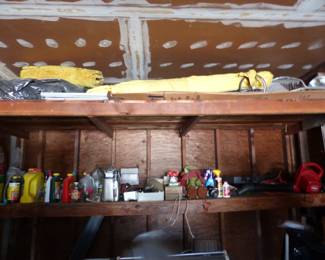 Full garage with assorted things 