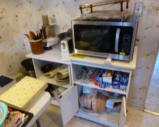 Kitchenware, microwave, small cabinets