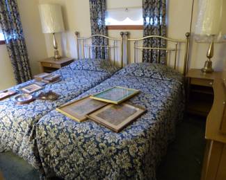 Pair of beds with brass headboards, pair vintage night tables & lamps