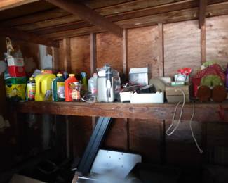 Full garage with assorted things 