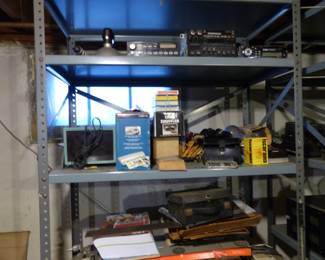 Loaded basement with tools, electronics, vintage cameras, tripods, projectors, vintage aircraft radio receiver and more!!
