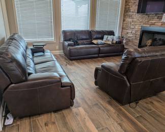 Fantastic leather reclining living room suite 