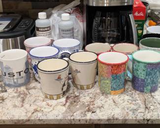 Nice collection of mugs including several Starbucks ones
