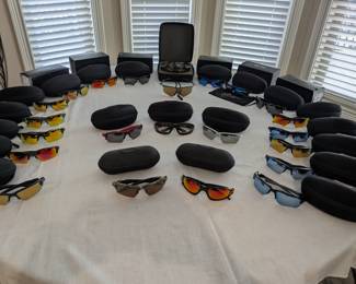 Oakley sunglasses (a few pictured here will be part of the online auction)