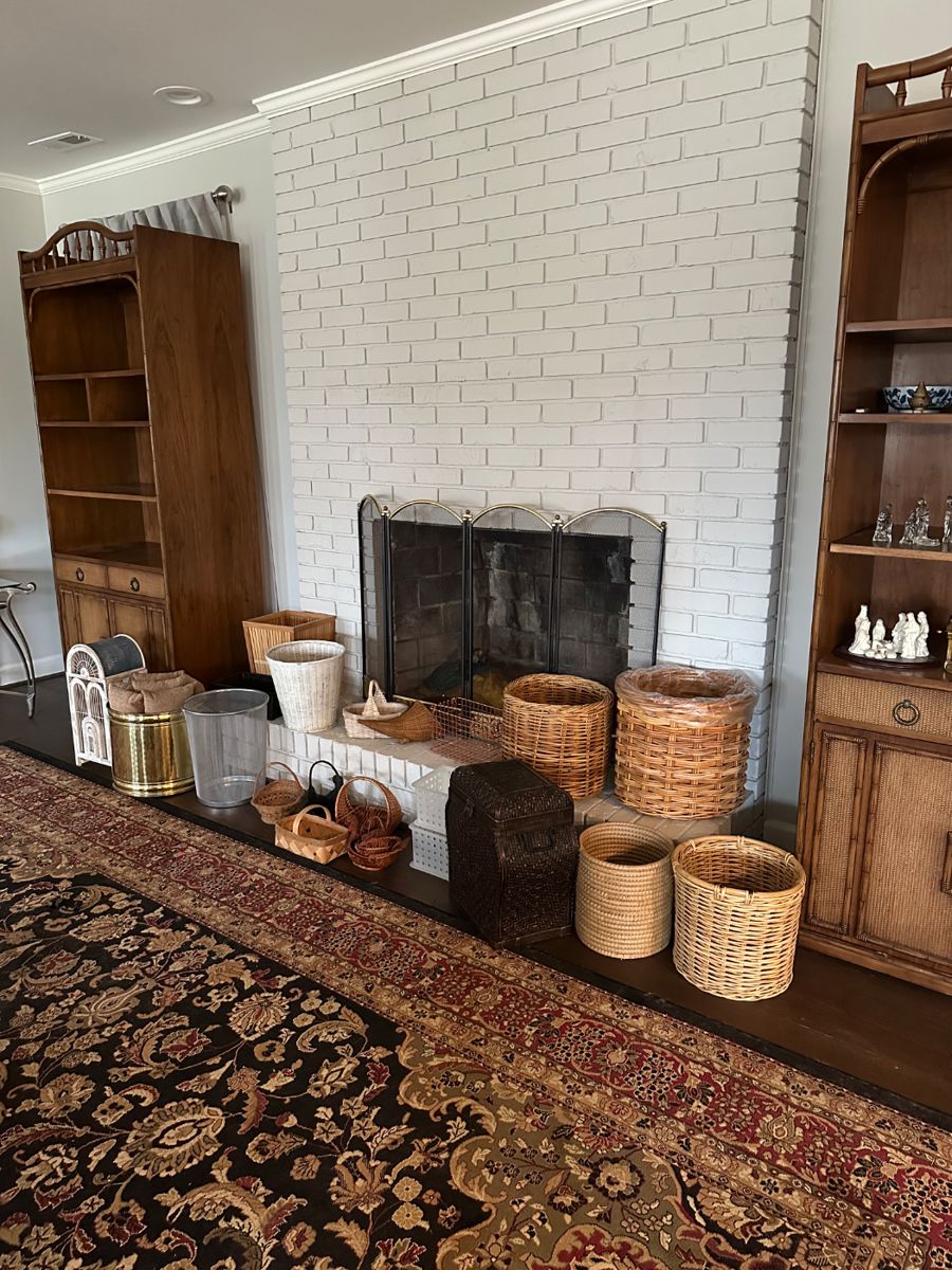 baskets, birdcage, rugs, fireplace screen, vintage shelves, trinkets