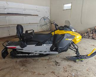 208	Ski-Doo MXZ Snowmobile	33 miles; minimum bid $4,500