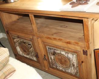 Rustic TV cabinet/stand. Cowhide and stars.